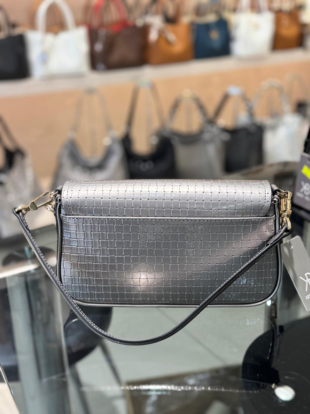 Silver handbag with gold chain