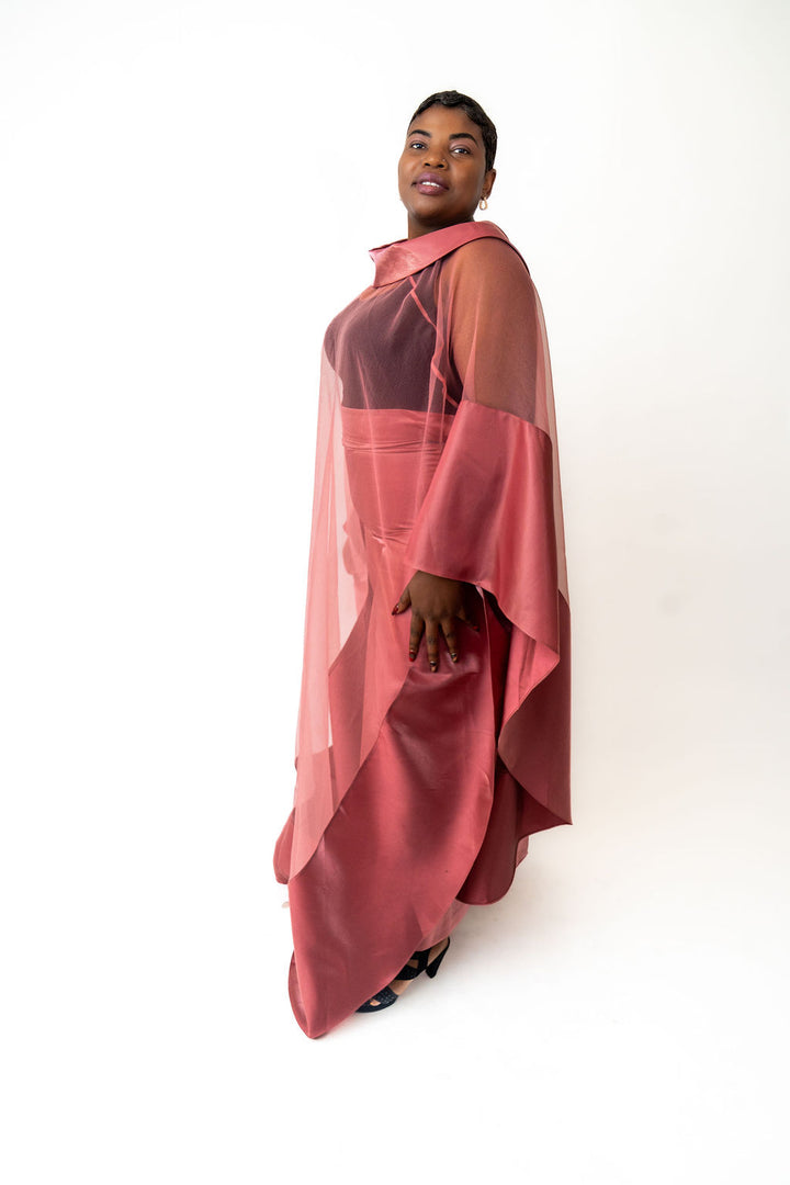 pink outfit with a sheer overlay