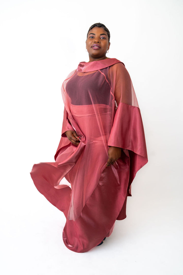 pink outfit with a sheer overlay