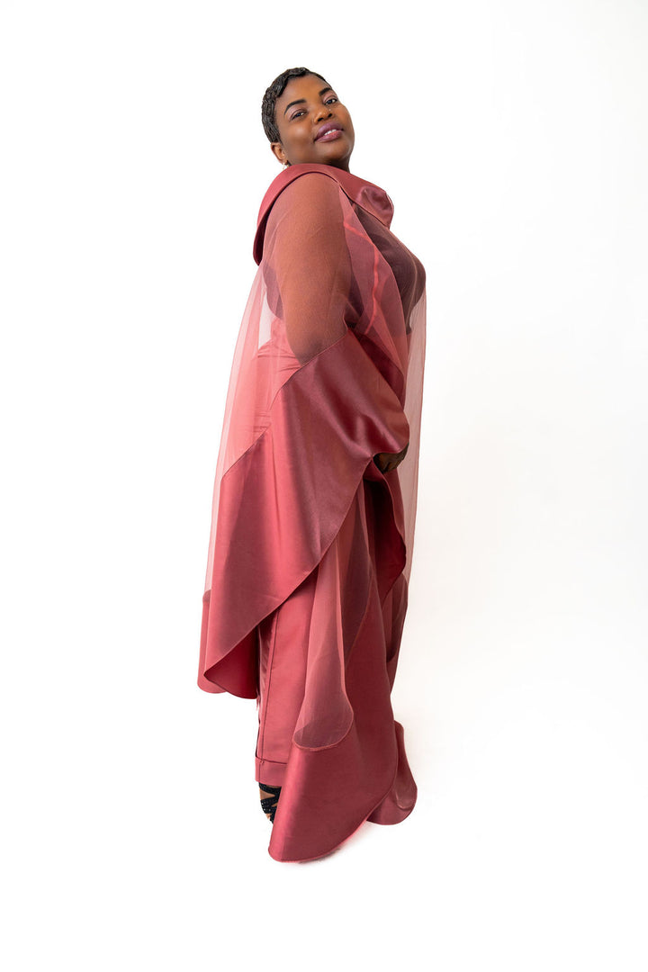 pink outfit with a sheer overlay