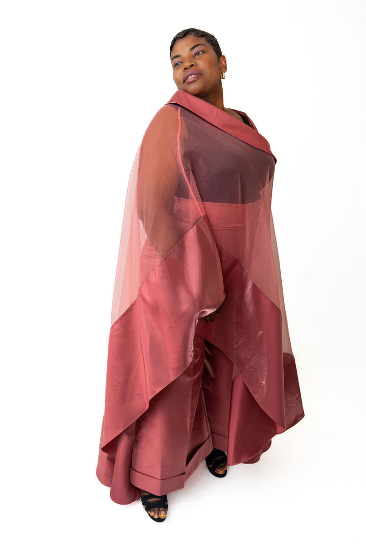 pink outfit with a sheer overlay