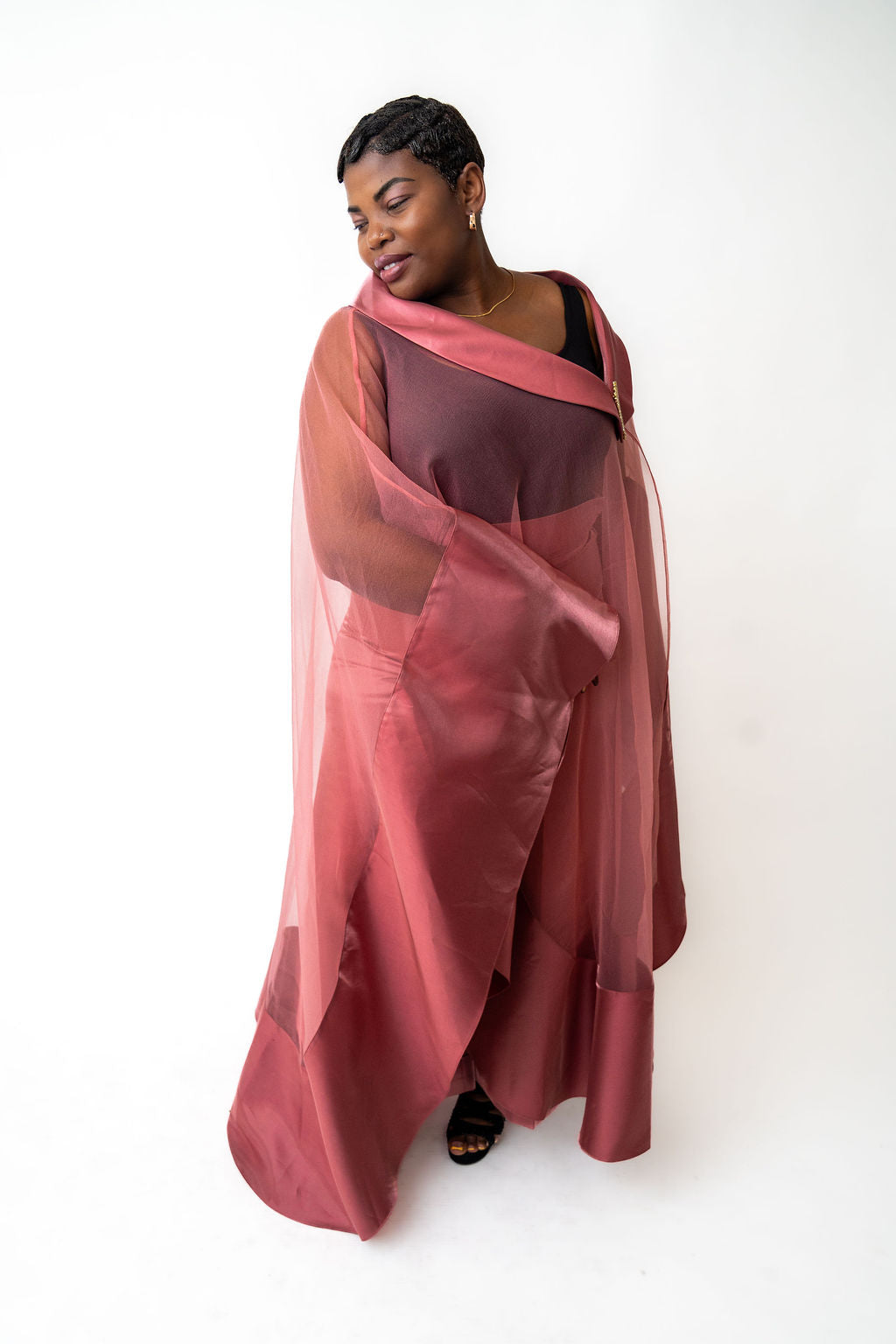 pink outfit with a sheer overlay