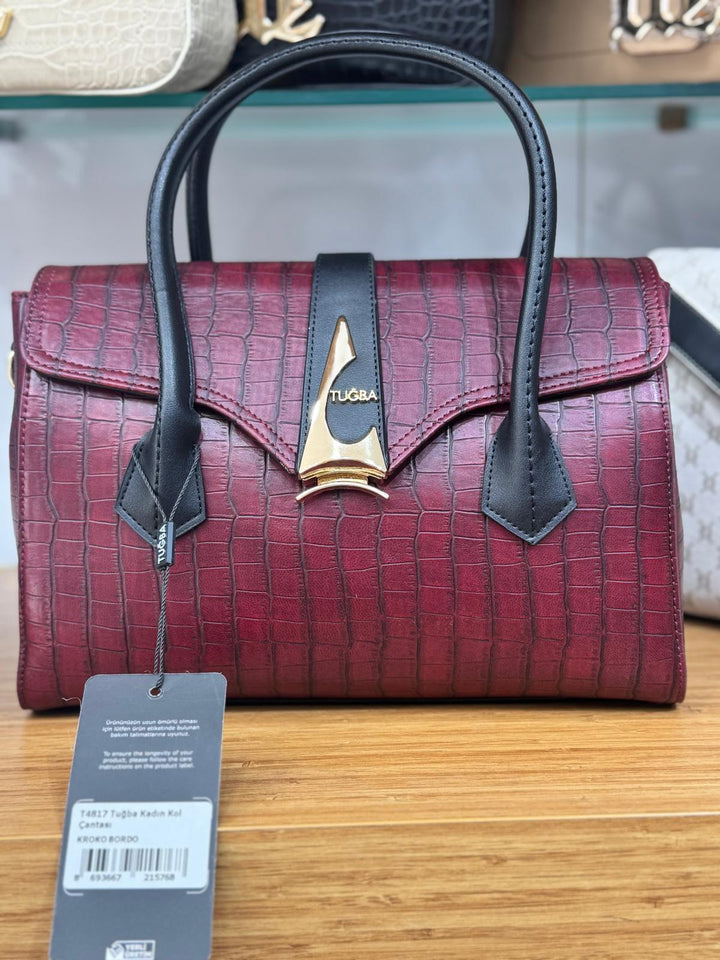 Red handbag with black handles