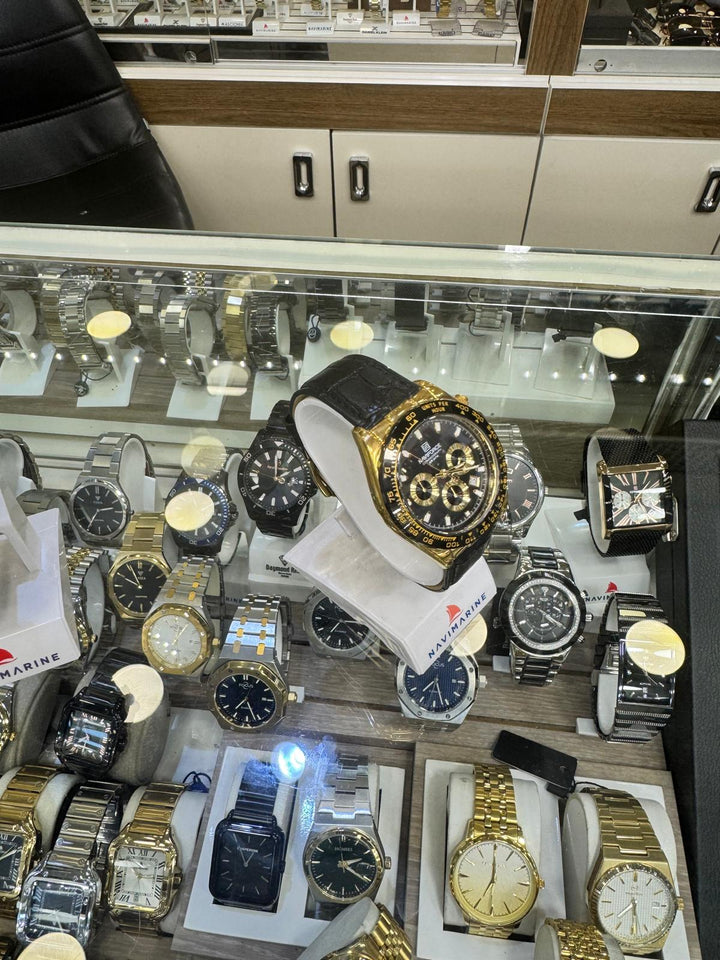 Gold and black watch