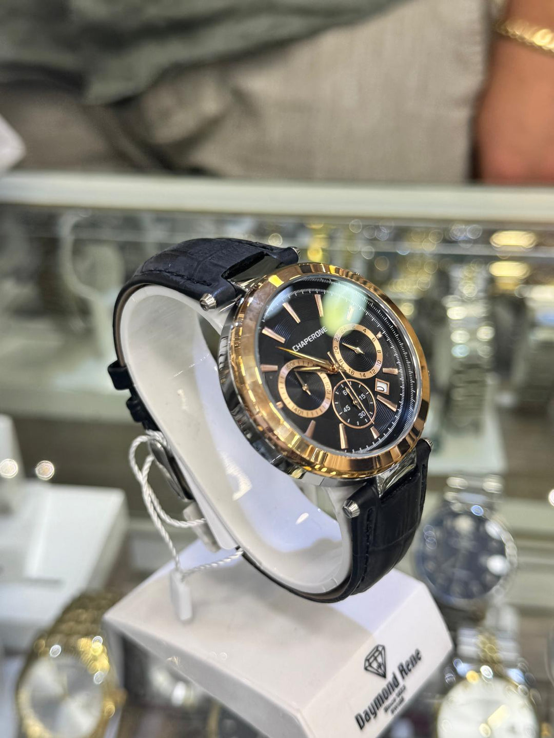 Gold and black watch